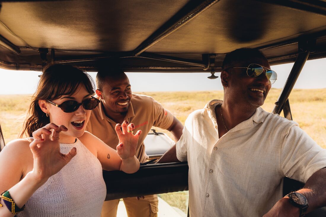 Sharing a silly moment after a lion spotting in Serengeti National Park