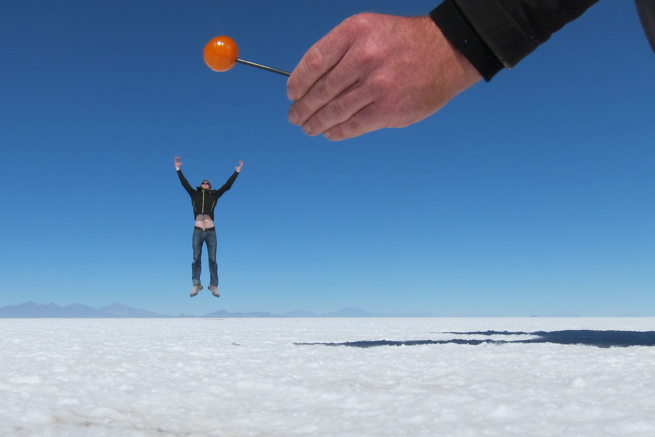bolivia_uyuni_man-jumps-for-lollipop