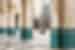 Local women walking through archways of Hassan II Mosque, Casablanca, Morocco