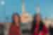 Smiling travellers with mosque behind them at dusk in Istanbul, Turkey