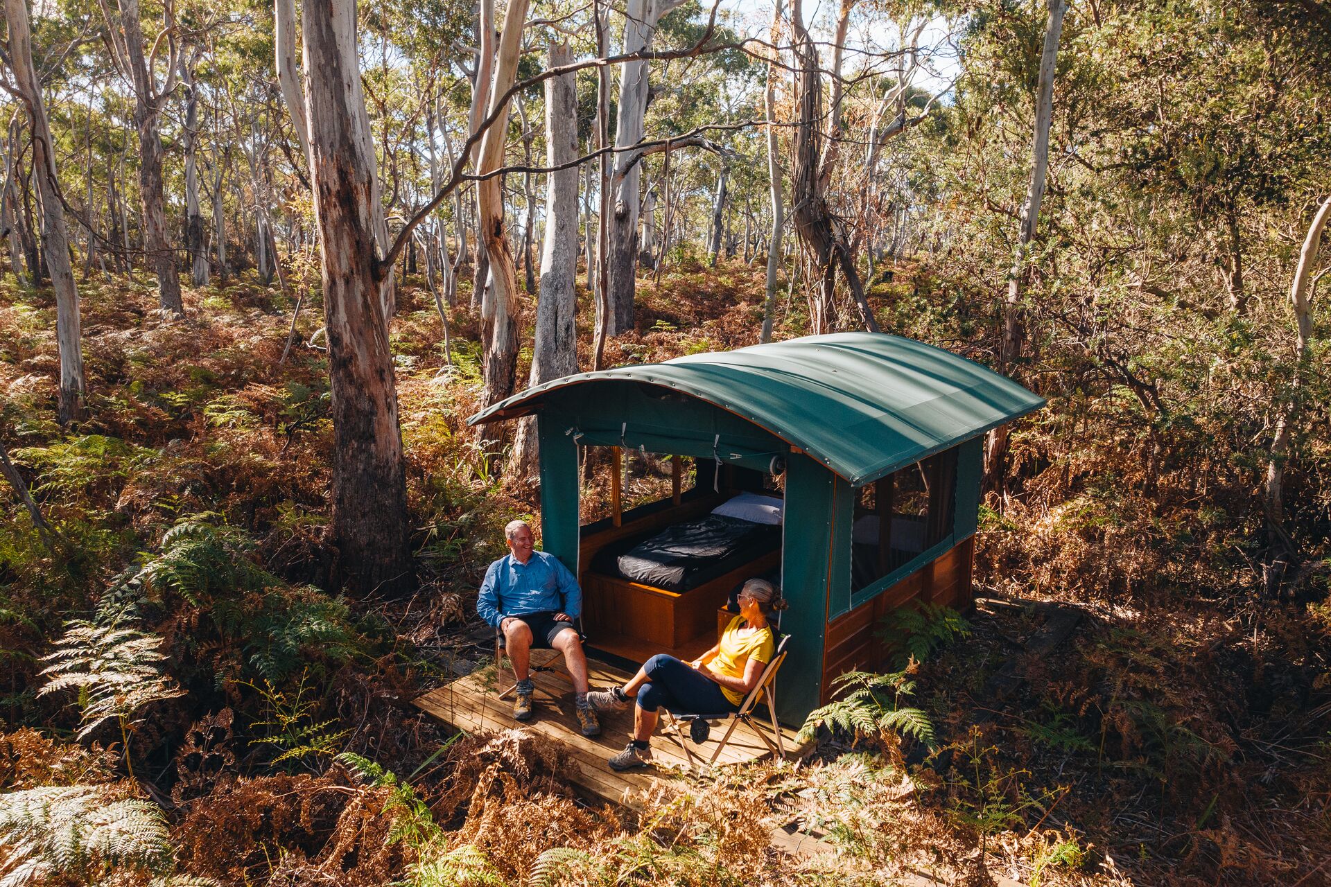 Take a load off after a long day's walk at your bush camp on Maria Island's coast