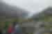 Travellers and leader hiking toward Exit Glacier in the mountains near Seward Alaska