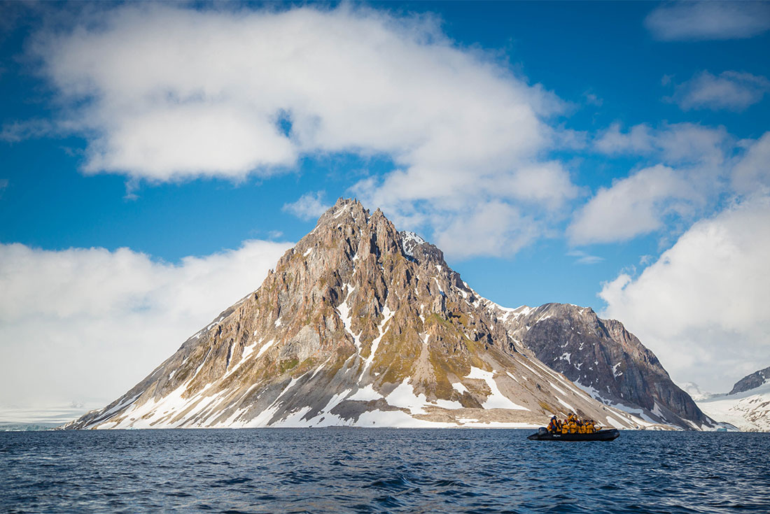 Zodiac cruising off the coast of Spitsbergen