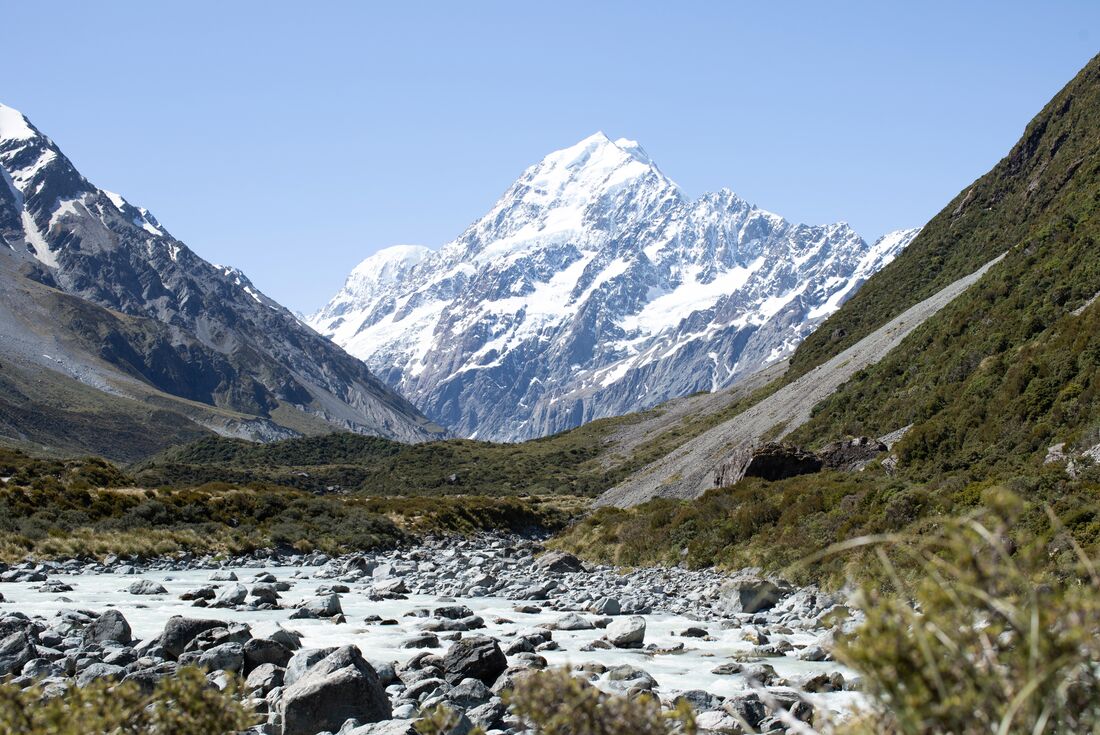 Mount Cook towers at the end of an alpine valley in the heart of New Zealand
