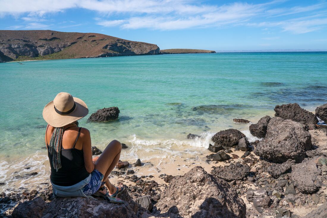 Intrepid traveller relaxing on Balandra Bay Beach, La Paz