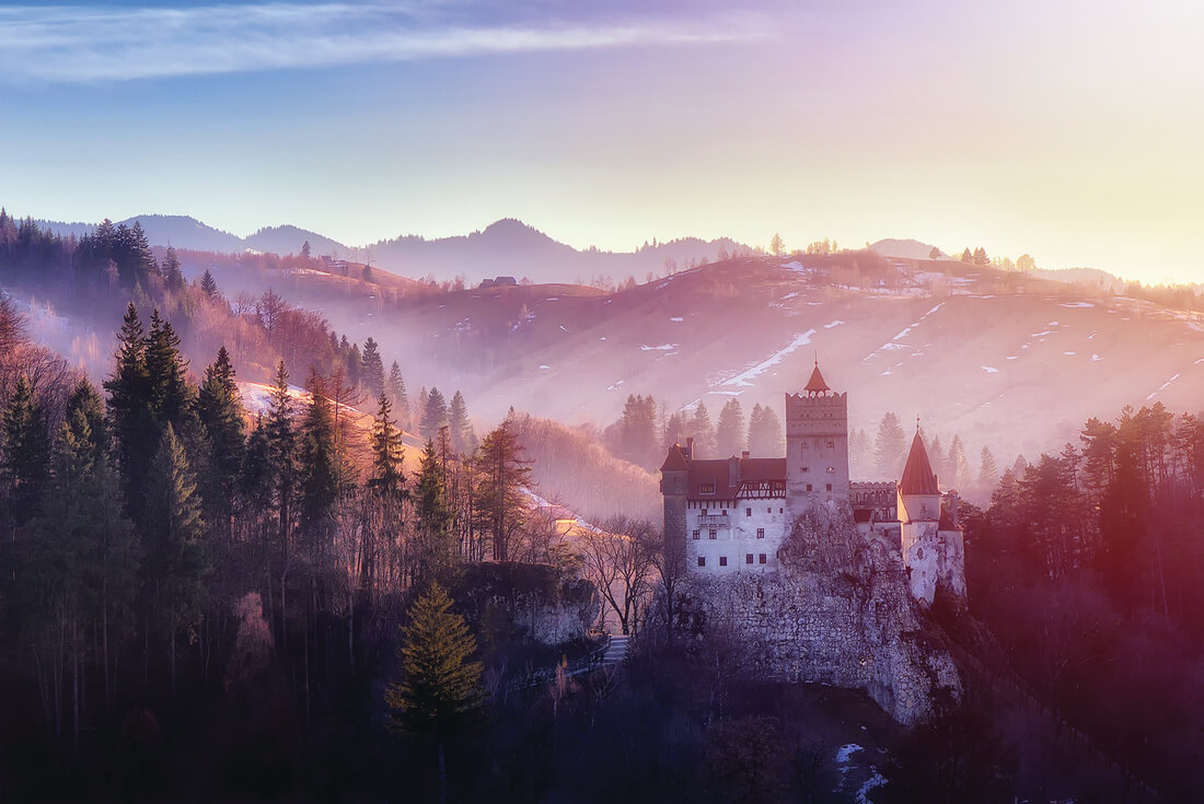 Dracula Castle in Transylvania, Romania. The castle is located on top of a mountain.