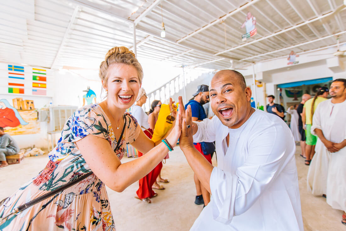 Traveller and local at the temples of Luxor in Egypt