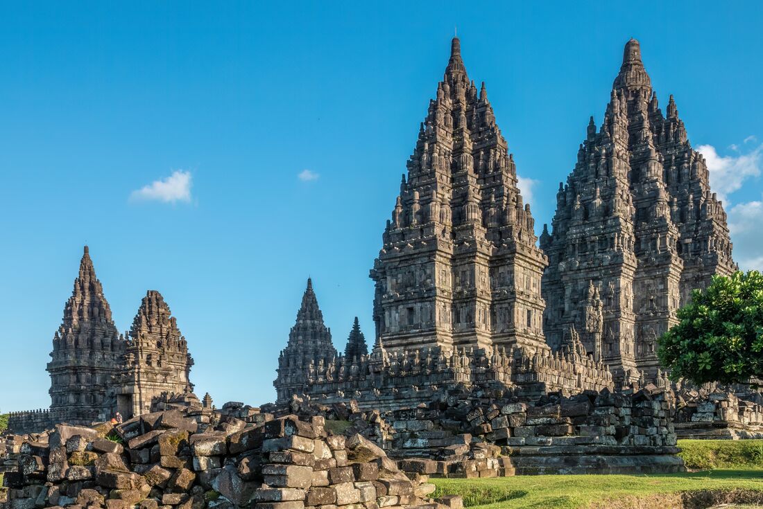 Prambanan Temple with tiny travellers exiting the interior