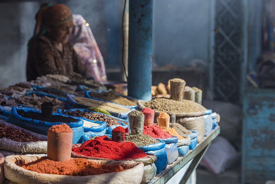 Beautiful vivid oriental market with bags full of various spices in Osh Kyrgyzstan.